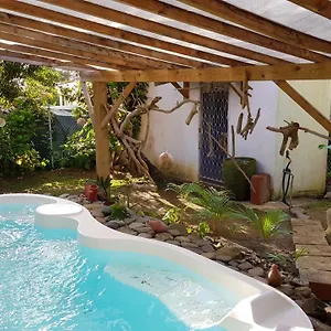 https://apartment-rue-du-fromager.comcaribbean.com